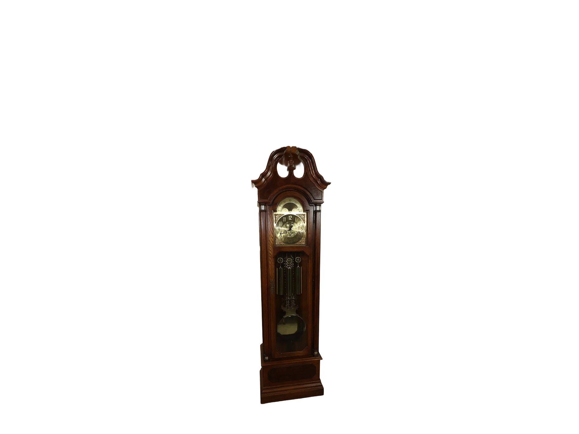 Vintage Howard Miller Marston 610-299 oak grandfather clock with elm burl accents, brass moon-phase dial, three weights, and lyre pendulum.